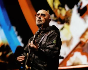 Guitarrista do Oasis é diagnosticado com câncer e anuncia que vai se afastar da turnê