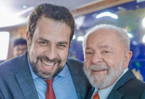 Lula brinca com Boulos sobre invasões em discurso sobre moradia